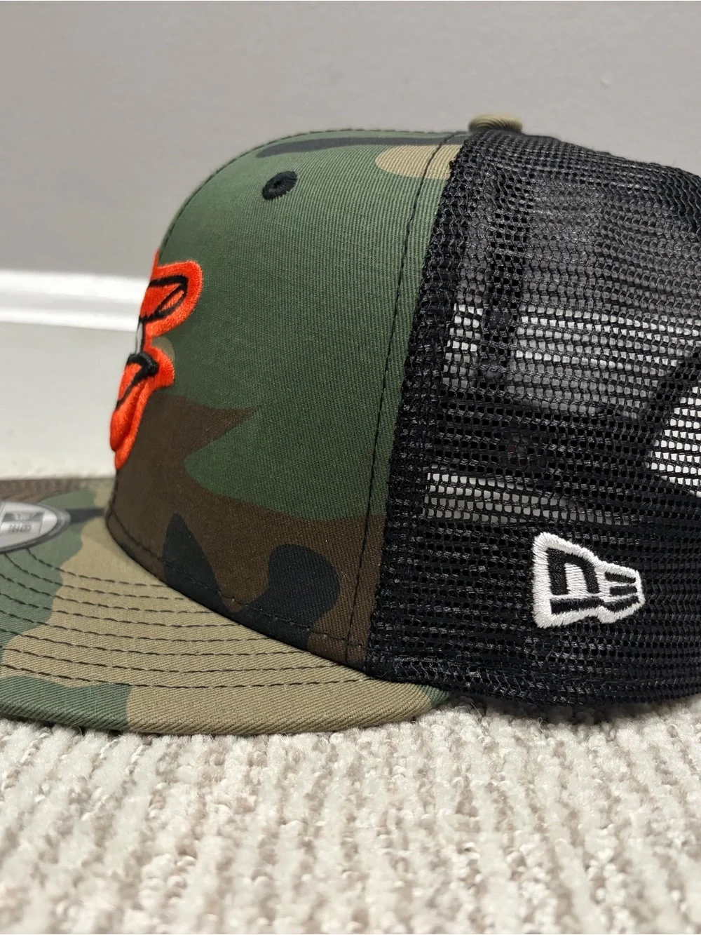 MLB Camo Snapback Trucker Hat with Orange Orioles Logo